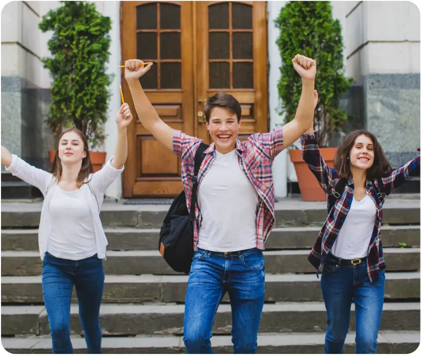 Students celebrating near historic building